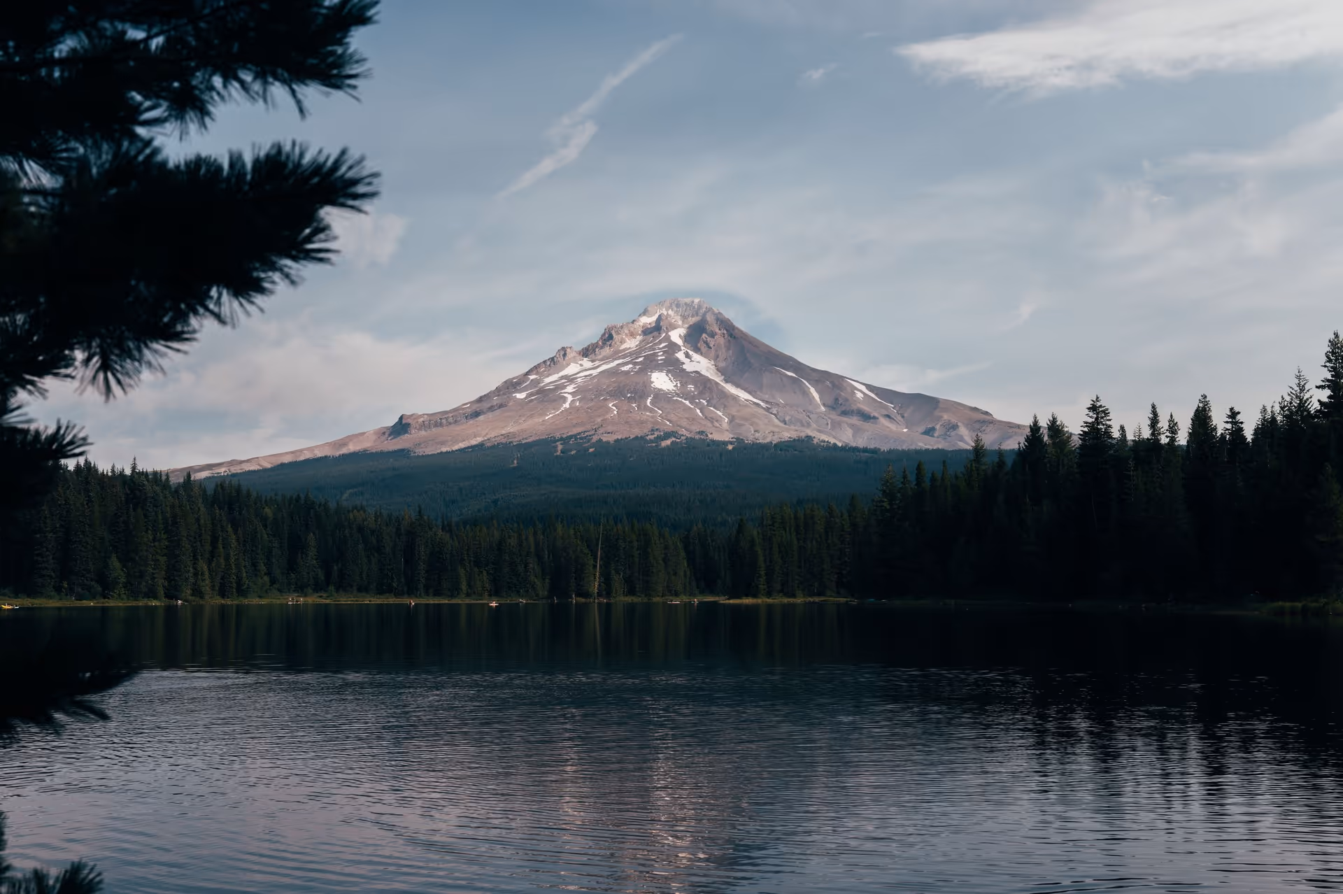 Mount Hood reflected in Trillium Lake, ringed by conifer forest